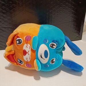Spark Create Imagine reversible plush toy that can be flipped between a blue dog